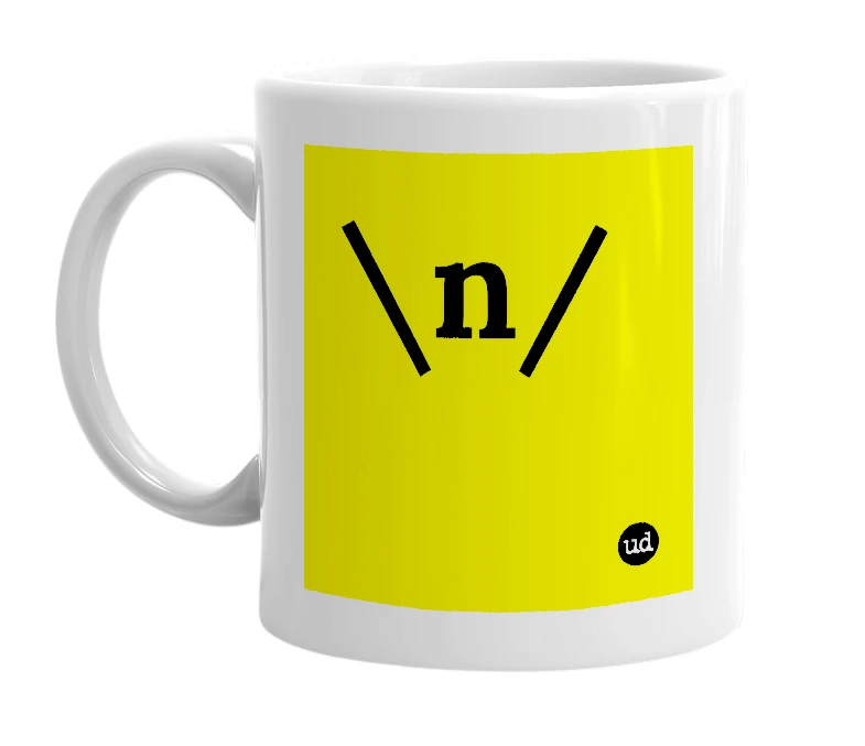 White mug with '\n/' in bold black letters