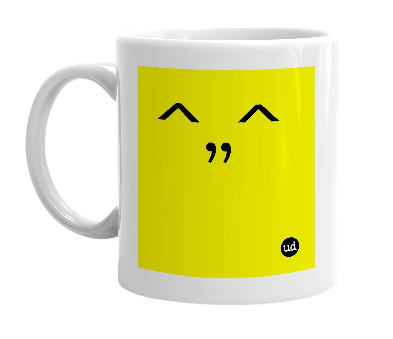 White mug with '^,,^' in bold black letters