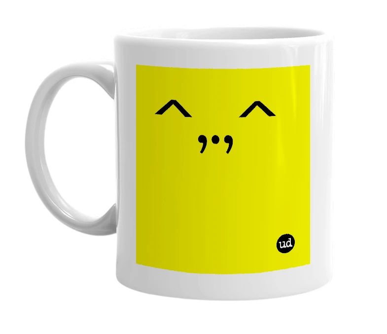 White mug with '^,.,^' in bold black letters