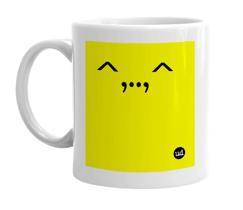 White mug with '^,..,^' in bold black letters