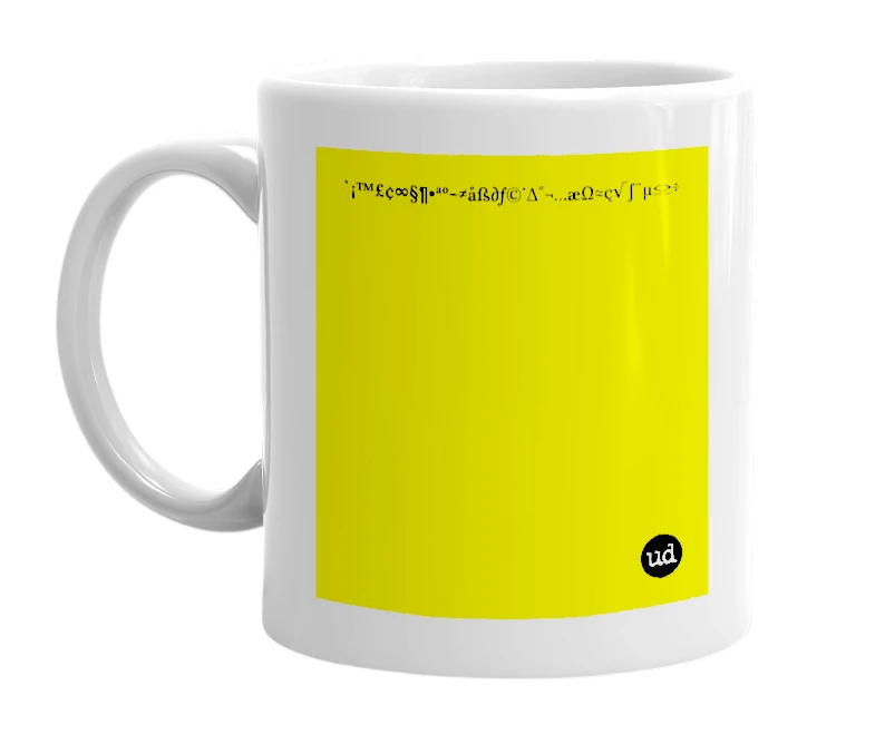 White mug with '`¡™£¢∞§¶•ªº–≠åß∂ƒ©˙∆˚¬…æΩ≈ç√∫˜µ≤≥÷' in bold black letters