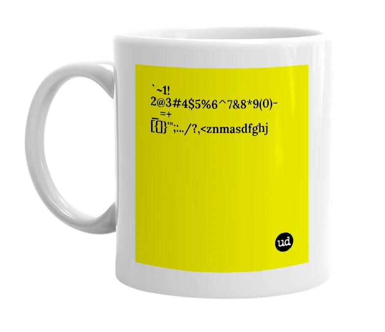 White mug with '`~1!2@3#4$5%6^7&8*9(0)-_=+[{]}'";:../?,<znmasdfghj' in bold black letters