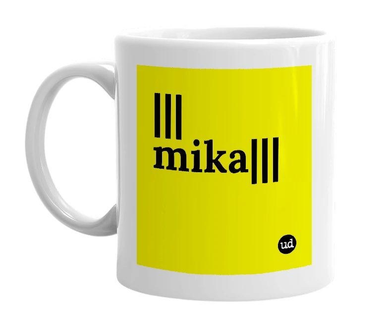 White mug with '|||mika|||' in bold black letters