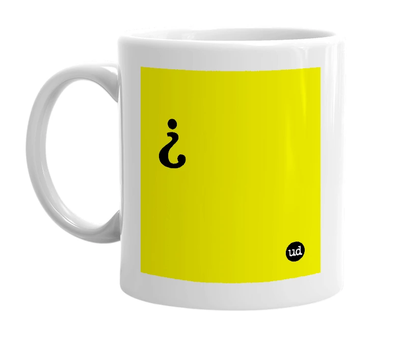 White mug with '¿' in bold black letters