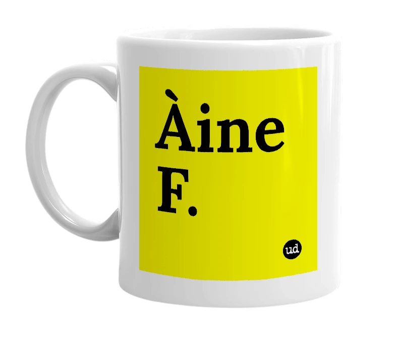White mug with 'Àine F.' in bold black letters
