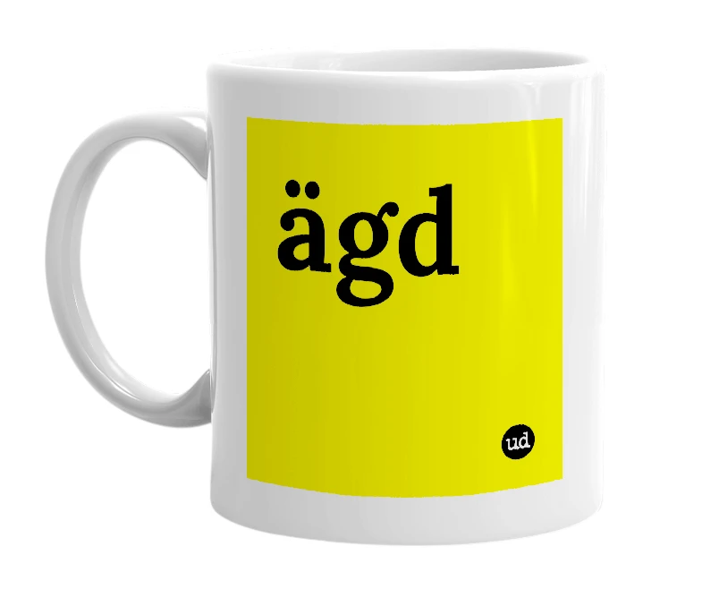White mug with 'ägd' in bold black letters