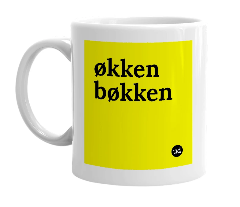 White mug with 'økken bøkken' in bold black letters