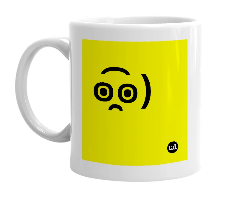 White mug with '๏̯͡๏﴿' in bold black letters