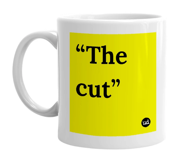 White mug with '“The cut”' in bold black letters