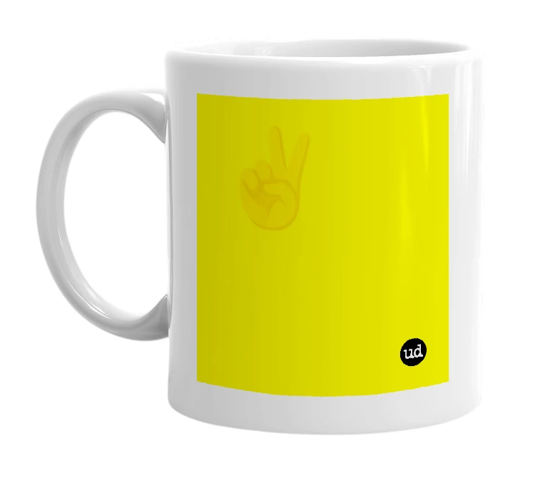 White mug with '✌️' in bold black letters