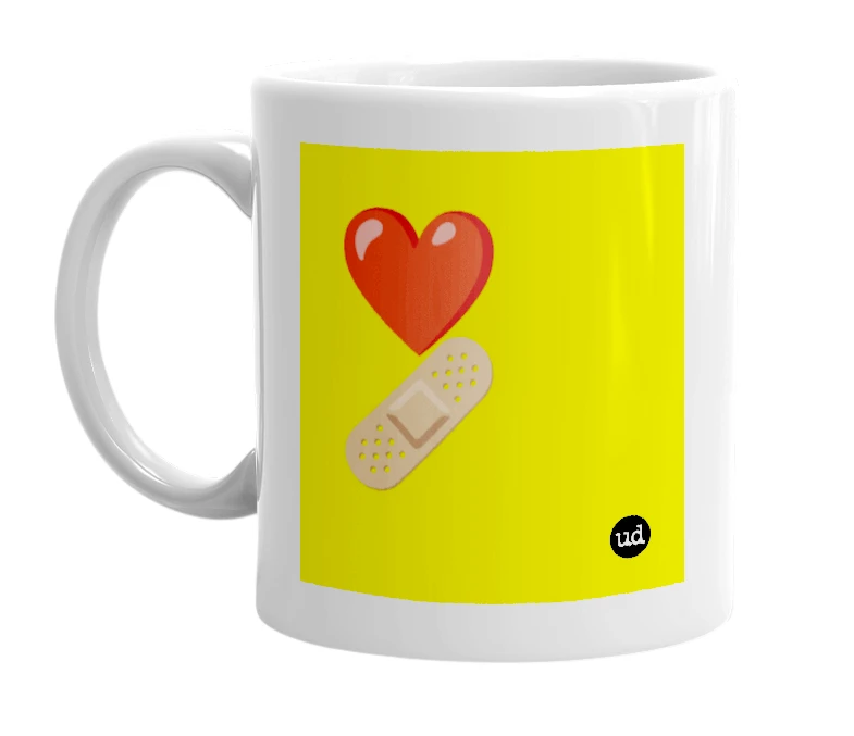 White mug with '❤️ 🩹' in bold black letters