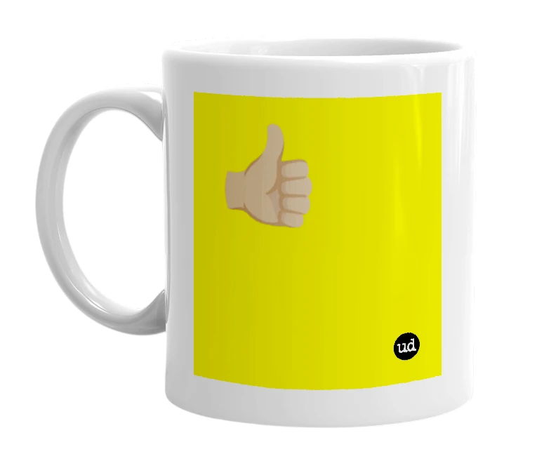 White mug with '👍🏽' in bold black letters