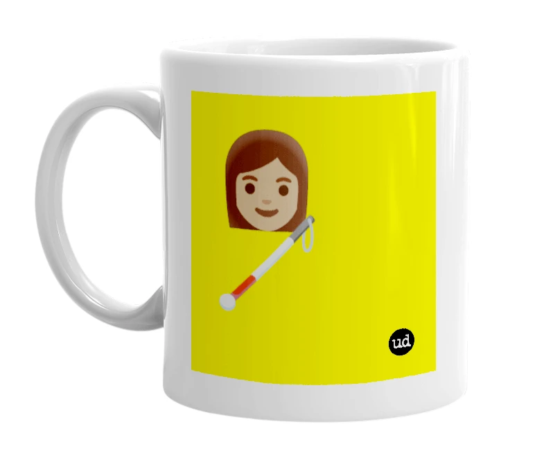 White mug with '👩🏽 🦯' in bold black letters