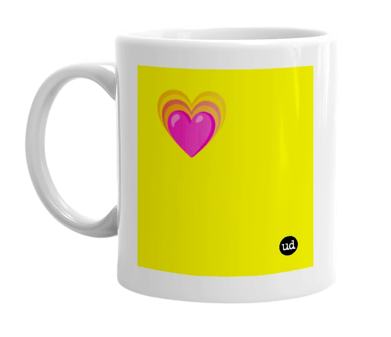 White mug with '💗' in bold black letters