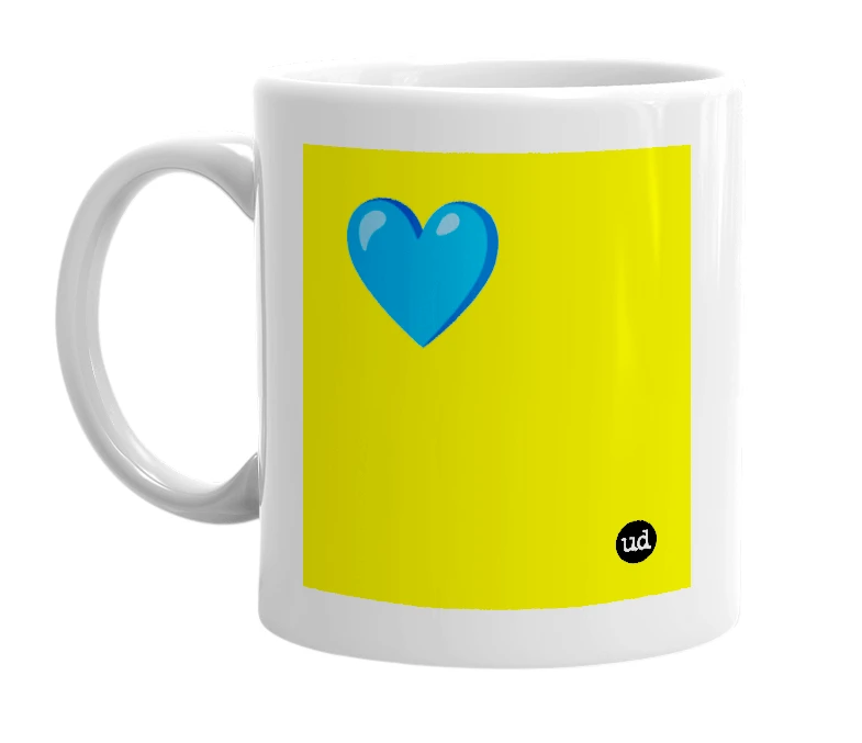 White mug with '💙' in bold black letters
