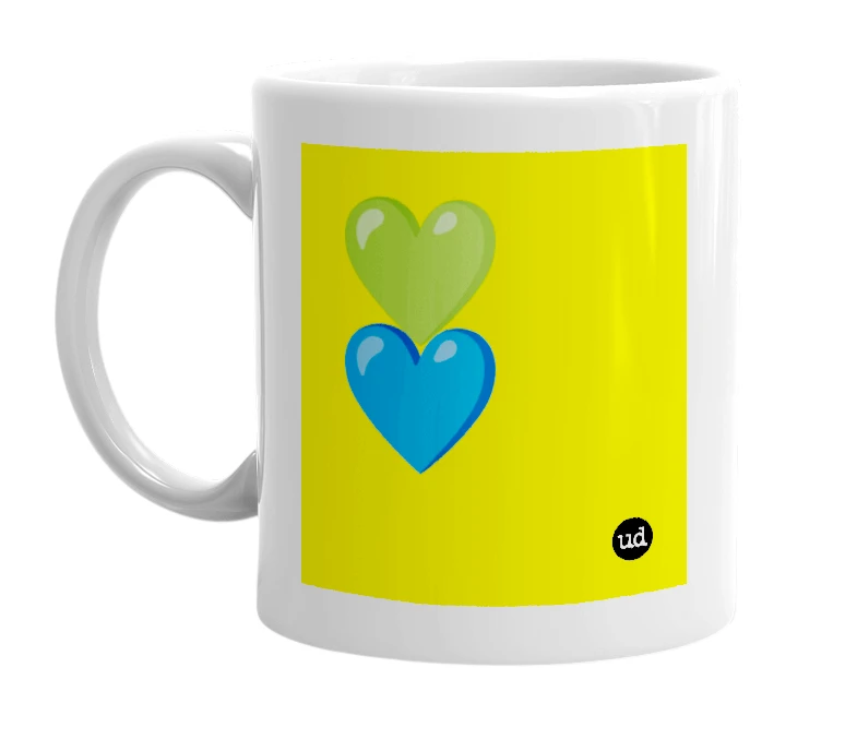 White mug with '💚💙' in bold black letters