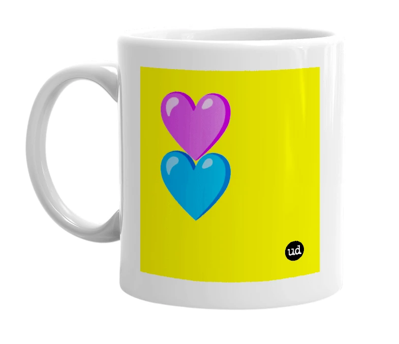 White mug with '💜💙' in bold black letters
