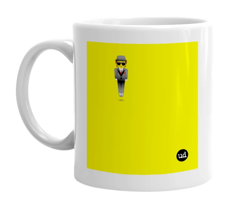 White mug with '🕴' in bold black letters