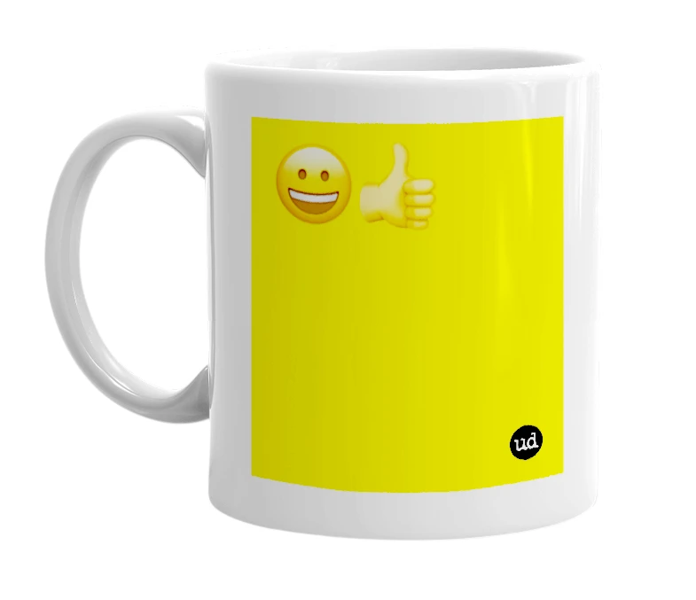 White mug with '😀👍' in bold black letters