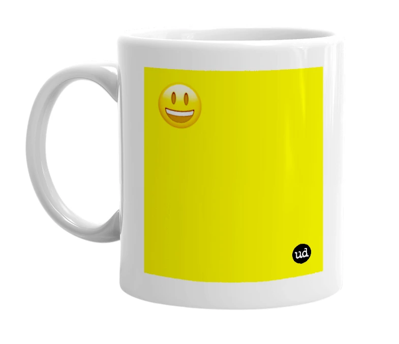 White mug with '😃' in bold black letters