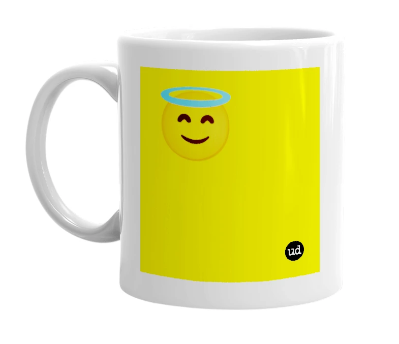 White mug with '😇' in bold black letters