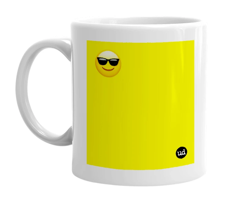 White mug with '😎' in bold black letters