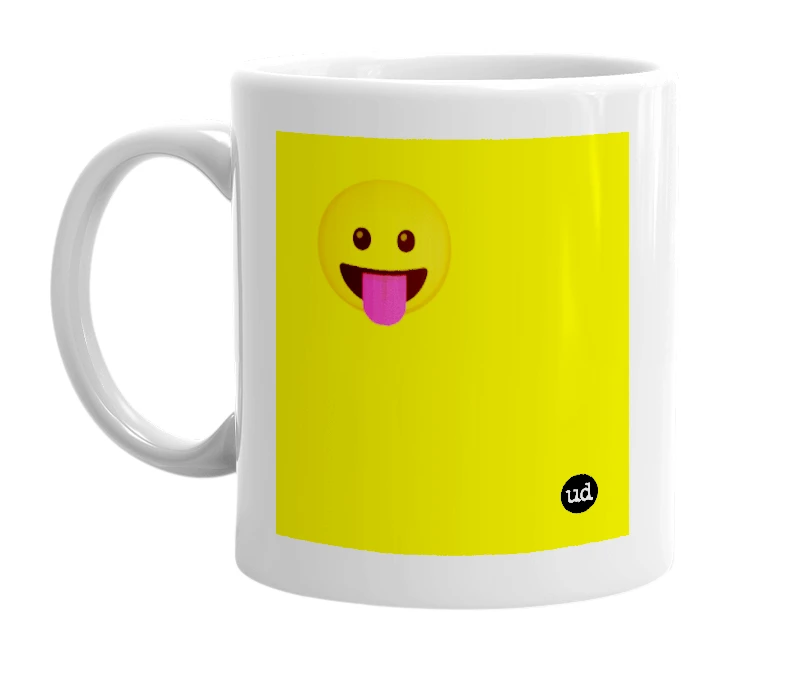 White mug with '😛' in bold black letters