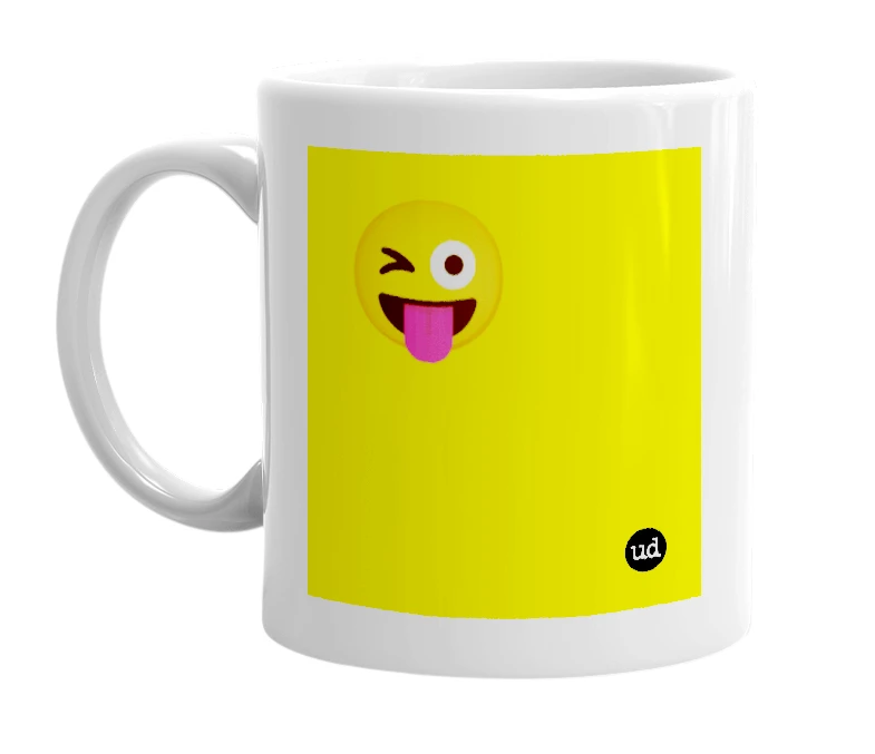 White mug with '😜' in bold black letters