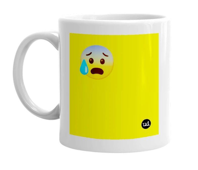 White mug with '😰' in bold black letters