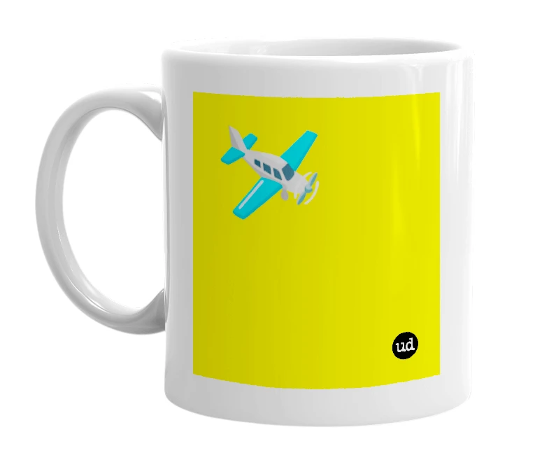 White mug with '🛩️' in bold black letters