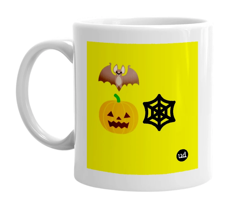 White mug with '🦇🎃🕸' in bold black letters