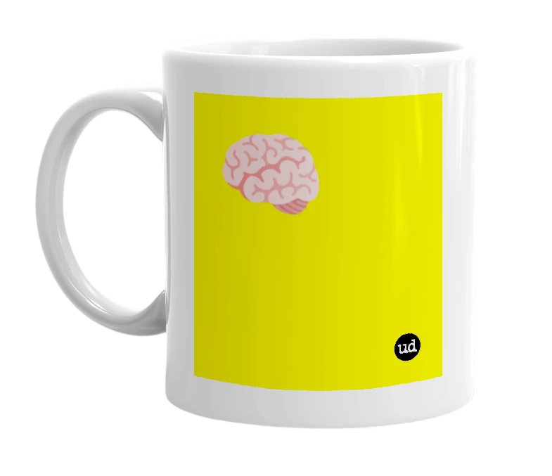 White mug with '🧠' in bold black letters