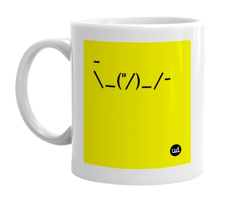 White mug with '-\_("/)_/-' in bold black letters