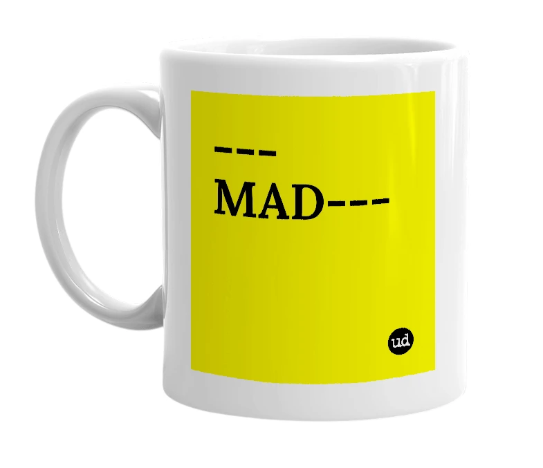 White mug with '---MAD---' in bold black letters