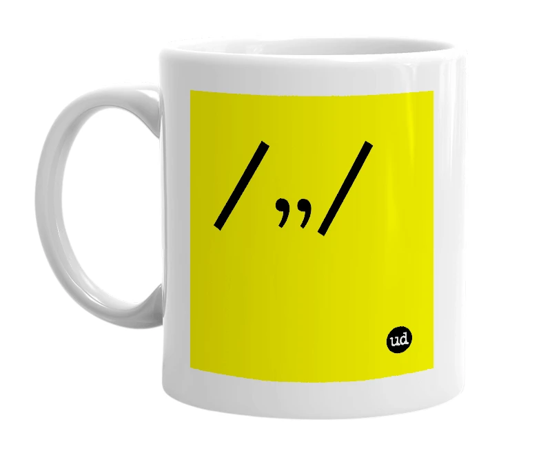 White mug with '/,,/' in bold black letters