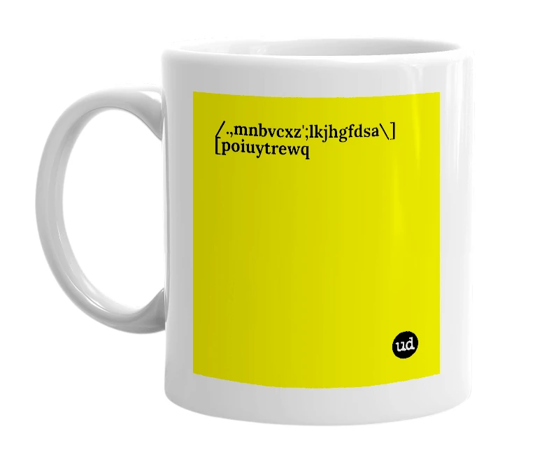 White mug with '/.,mnbvcxz';lkjhgfdsa\][poiuytrewq' in bold black letters