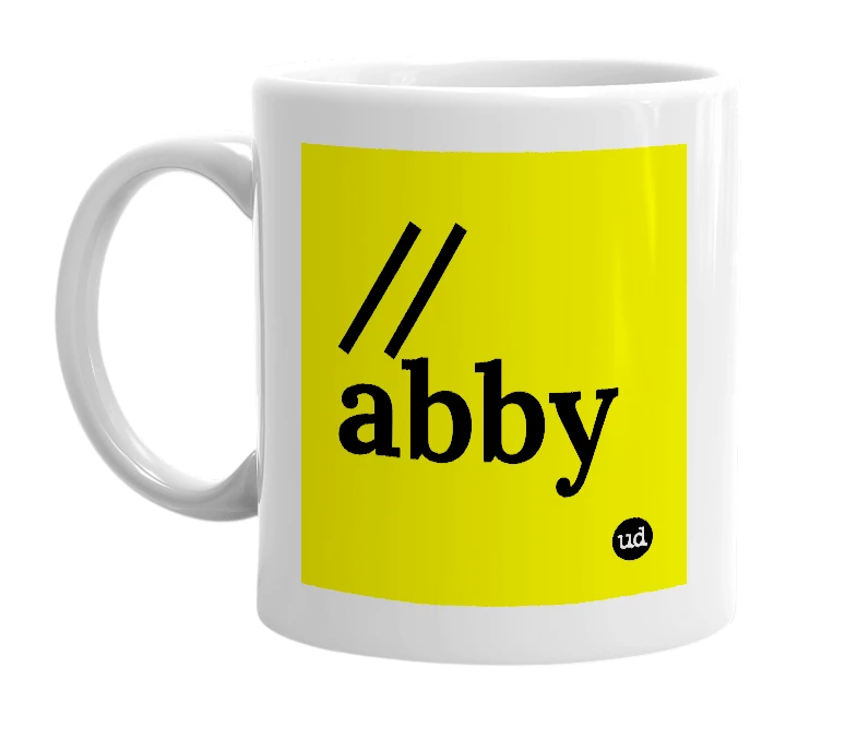 White mug with '//abby' in bold black letters