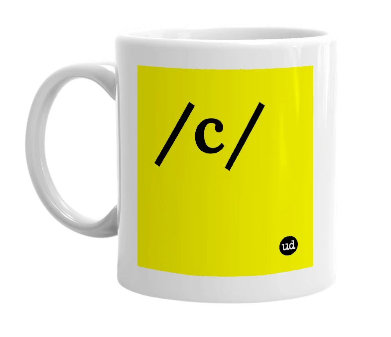 White mug with '/c/' in bold black letters