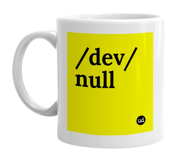 White mug with '/dev/null' in bold black letters