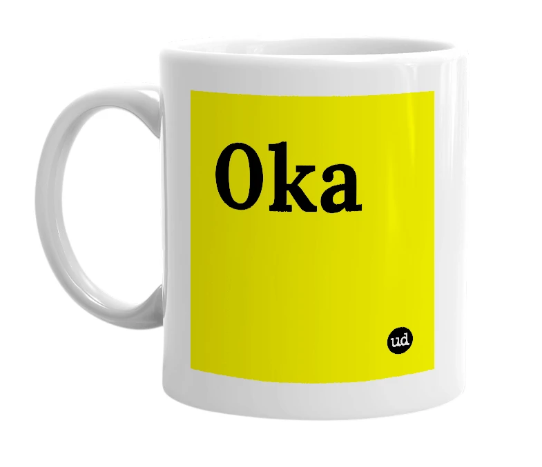 White mug with '0ka' in bold black letters