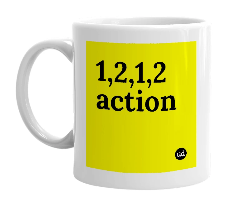 White mug with '1,2,1,2 action' in bold black letters