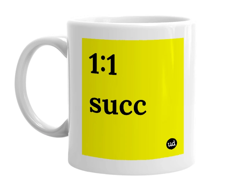 White mug with '1:1 succ' in bold black letters