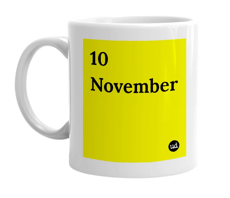 White mug with '10 November' in bold black letters