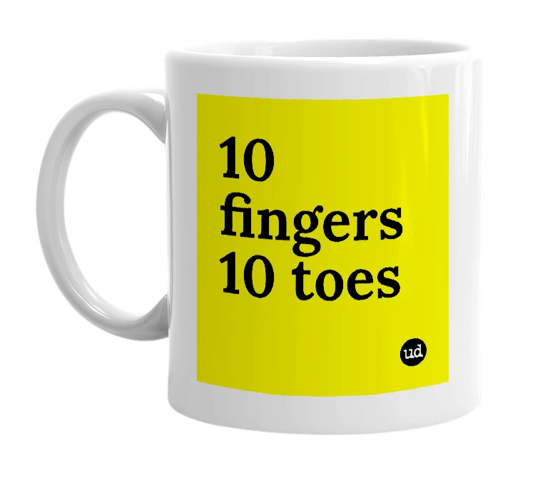 White mug with '10 fingers 10 toes' in bold black letters