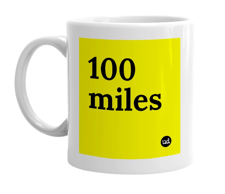 White mug with '100 miles' in bold black letters