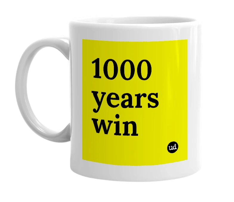 White mug with '1000 years win' in bold black letters