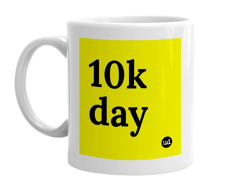 White mug with '10k day' in bold black letters