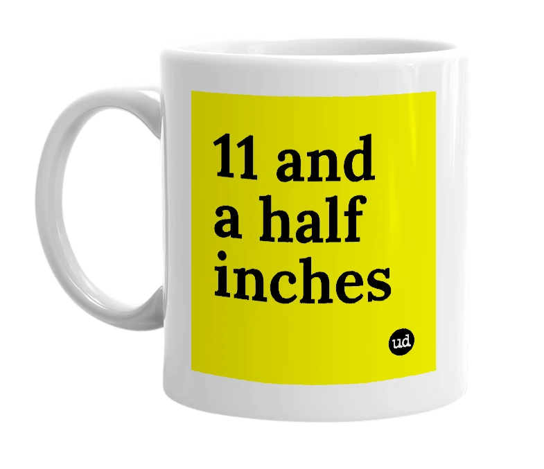 White mug with '11 and a half inches' in bold black letters