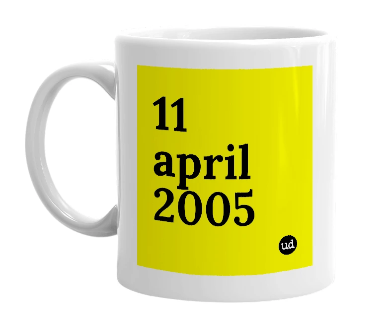 White mug with '11 april 2005' in bold black letters