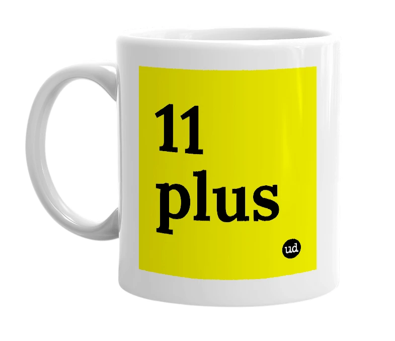 White mug with '11 plus' in bold black letters